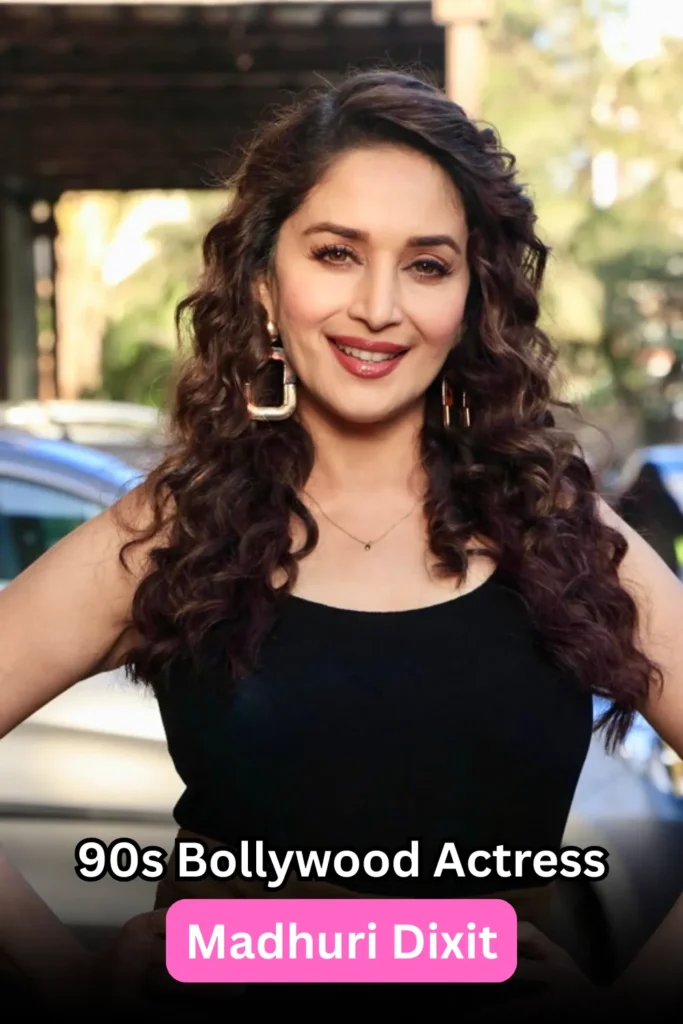 Madhuri Dixit smiling in a traditional outfit – 90s Bollywood actress known for dance and expressions